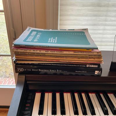 L1200 Yamaha Electric Piano with Sheet Music