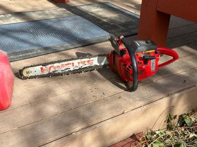 HOMELITE SUPER XL CHAINSAW WITH GAS CAN