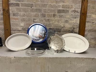 Sale Photo Thumbnail #238: Vintage serving tray, blue ice lip pitcher, silver-tone aluminum footed fruit bowl, white oval platters-note crazing on Fiestaware platter, PYREX pie plate and crystal flatware holder