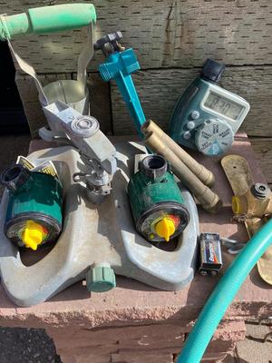 AN ASSORTMENT OF SPRINKLERS, TIMERS & MORE
