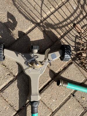 AN ASSORTMENT OF SPRINKLERS, TIMERS & MORE