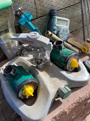 AN ASSORTMENT OF SPRINKLERS, TIMERS & MORE