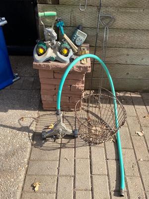AN ASSORTMENT OF SPRINKLERS, TIMERS & MORE