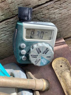 AN ASSORTMENT OF SPRINKLERS, TIMERS & MORE