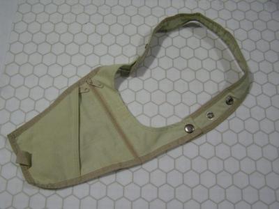 Under jacket shoulder packet/holster for money, passport, wallet, etc.