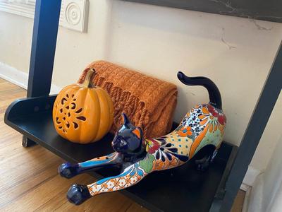 CERAMIC CAT, SOFT ORANGE THROW AND PORCELAIN PUMPKIN TEA-LIGHT CANDLE HOLDER