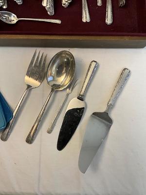 Sale Photo Thumbnail #337: 9 luncheon forks, 9 luncheon knives, 9 soup spoons, 9 butter spreaders, 9 salad forks, 15 teaspoons, 2 icetea spoons, 1 sugar spoon, 1 cheese server, 1 large meat fork, 1 cake server, 2 large serving spoons, 1 berry serving spoon, 1 slotted serving spoon 