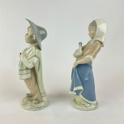 Sale Photo Thumbnail #613: Rex Figures Measuring 10" high (boy and girl with duck and chickens) 
Porceval figures measure approximately 8.5" high ( girls with cat and goats) 
Very good condition