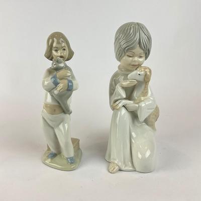 Sale Photo Thumbnail #617: Rex Figures Measuring 10" high (boy and girl with duck and chickens) 
Porceval figures measure approximately 8.5" high ( girls with cat and goats) 
Very good condition