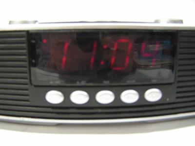 Do you hear that? SYLVANIA alarm clock radio. AM/FM/alarm/snooze/sleep.