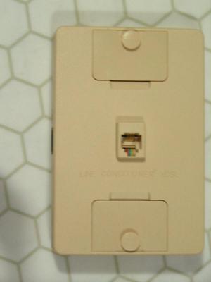 Shuttle brand phone line conditioner for DSL to a wall mount phone