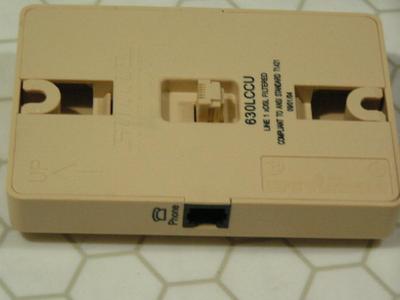 Shuttle brand phone line conditioner for DSL to a wall mount phone