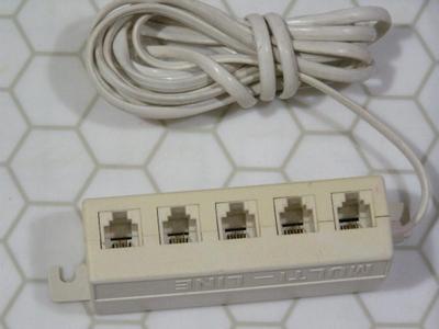 5-way phone line splitter w/phone line extension.