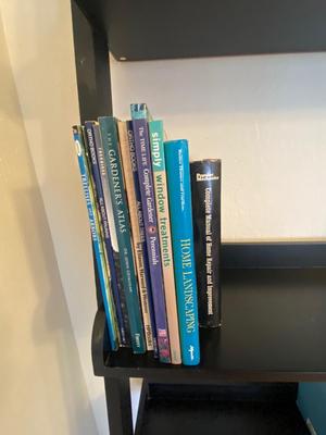 5 TIER LADDER SHELF WITH AN ASSORTMENT OF BOOKS