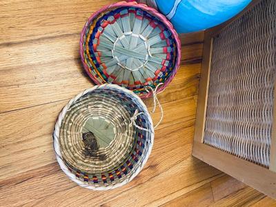 A VARIETY OF DIFFERENT BASKETS WITH EASTER AROUND THE CORNER AND HOME DECOR