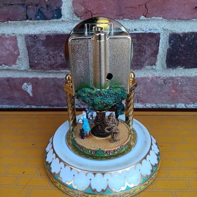LOT 268: Franklin Mint Wizard of Oz Display Stand, Anniversary Clock & More