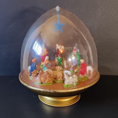 LOT 334: Enesco 'Winter Wonderland' Music Box, Ohio Art Musical Nativity, Italian Paper Mache Nativity & More