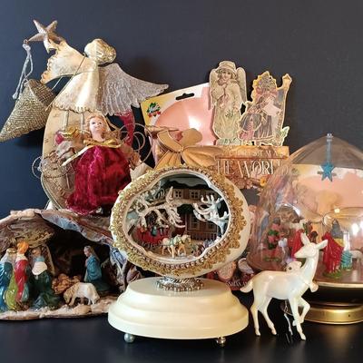 LOT 334: Enesco 'Winter Wonderland' Music Box, Ohio Art Musical Nativity, Italian Paper Mache Nativity & More