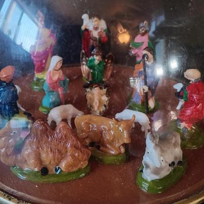LOT 334: Enesco 'Winter Wonderland' Music Box, Ohio Art Musical Nativity, Italian Paper Mache Nativity & More
