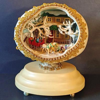 LOT 334: Enesco 'Winter Wonderland' Music Box, Ohio Art Musical Nativity, Italian Paper Mache Nativity & More