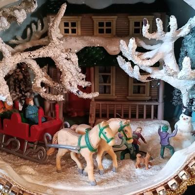 LOT 334: Enesco 'Winter Wonderland' Music Box, Ohio Art Musical Nativity, Italian Paper Mache Nativity & More