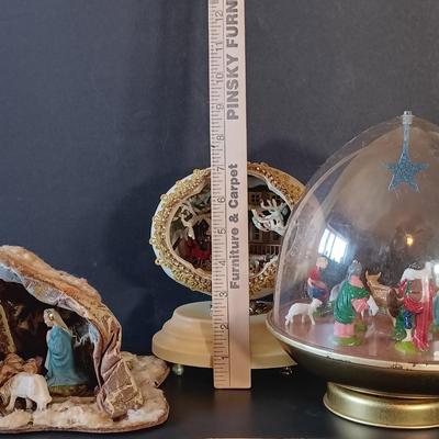 LOT 334: Enesco 'Winter Wonderland' Music Box, Ohio Art Musical Nativity, Italian Paper Mache Nativity & More