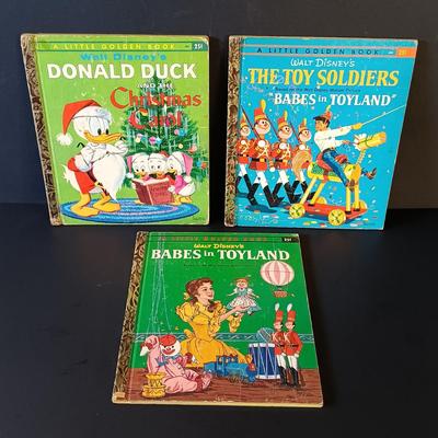 LOT 336: Disney Golden Books 'Donald Duck and the Christmas Carol', Verichron Mickie & Minnie Clock, Hallmark 100th...