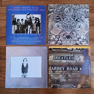 LOT 382: Vintage LPs- Grateful Dead, Foreigner, The Beatles & More