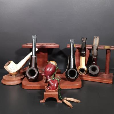 LOT 387: Collection of Pipes and Pipe Stands- Knockcrochery Lally Clay Pipe, Bruyere Garantie Pipe & More