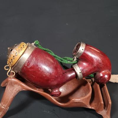 LOT 387: Collection of Pipes and Pipe Stands- Knockcrochery Lally Clay Pipe, Bruyere Garantie Pipe & More