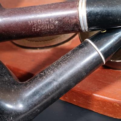 LOT 387: Collection of Pipes and Pipe Stands- Knockcrochery Lally Clay Pipe, Bruyere Garantie Pipe & More