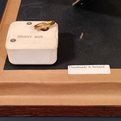 LOT 390: The Franklin Mint Carousel Clock, Danny Boy Poem Music Box Frame & 'The Irish' Coffee Table Book