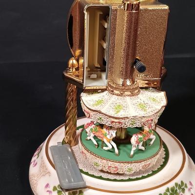 LOT 390: The Franklin Mint Carousel Clock, Danny Boy Poem Music Box Frame & 'The Irish' Coffee Table Book