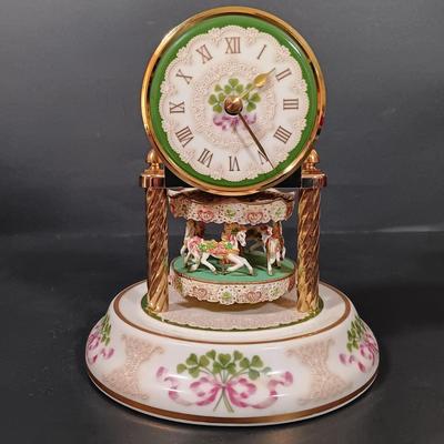 LOT 390: The Franklin Mint Carousel Clock, Danny Boy Poem Music Box Frame & 'The Irish' Coffee Table Book