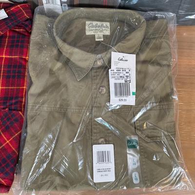 LOT 30Y: Collection Of New in Package / New With Tags Clothing - Shirts, Belts, Pants & More