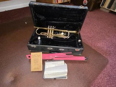 HOLTON BRASS TRUMPET WITH CASE, SLIDE OIL, MUSIC AND PINK LYRE