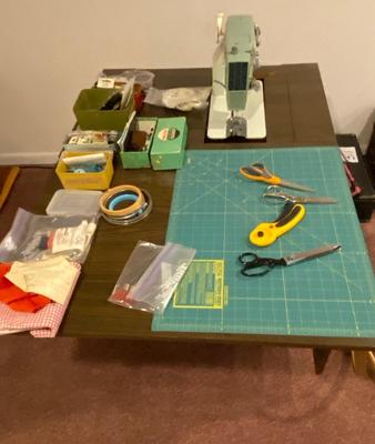 VINTAGE DRESSMAKERS SEWING MACHINE IN CABINET WITH SEWING NOTIONS AND MORE