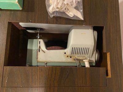 VINTAGE DRESSMAKERS SEWING MACHINE IN CABINET WITH SEWING NOTIONS AND MORE