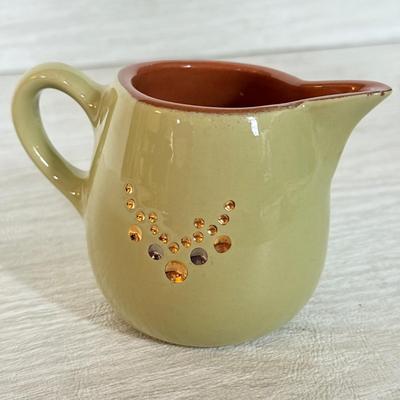 LOT 165K: Vintage Stangl Holiday Collection: Magnolia 14" Platter, Christmas Tree Cream Pitcher & Cranberry Saucer