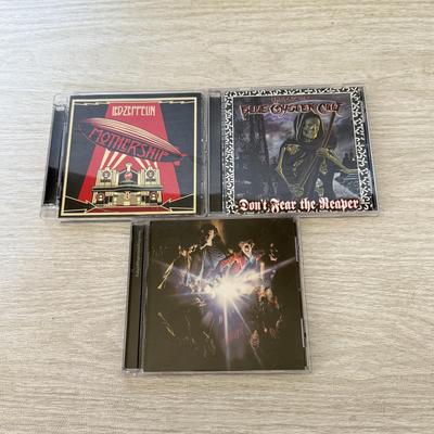 LOT 195D: Queen We Will Rock You VHS Tape & Collection of Rock Music CDs