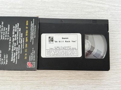 LOT 195D: Queen We Will Rock You VHS Tape & Collection of Rock Music CDs
