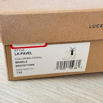 LOT 199D: Ladies' Shoes w/ Boxes: Lucky Brand Brindle Bridgetown Boodies (7) & Steve Madden Patent Leather Flats (7.5)