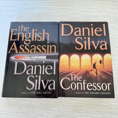 LOT 209L: Daniel Silva Novel Collection incl. 2004 Signed Copy of “A Death in Vienna”