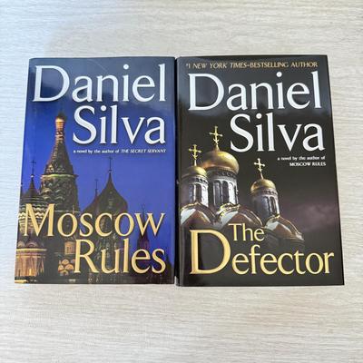 LOT 209L: Daniel Silva Novel Collection incl. 2004 Signed Copy of “A Death in Vienna”