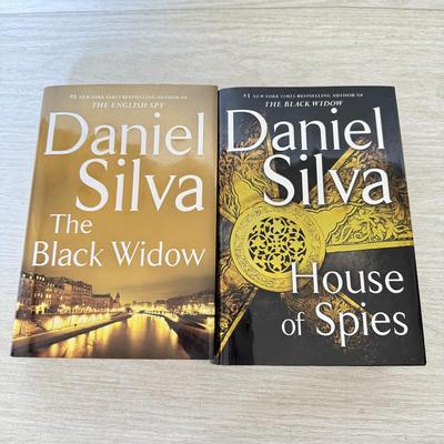 LOT 209L: Daniel Silva Novel Collection incl. 2004 Signed Copy of “A Death in Vienna”