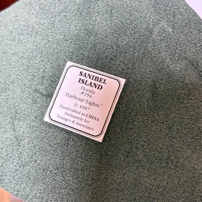 LOT 220D: Harbor Lights Lighthouses: Sanibel Island Florida #194 & Society Exclusive Amelia Island Florida #505