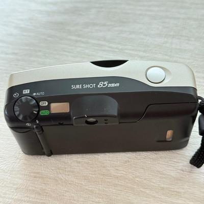 LOT 277K: Canon Sure Shot 85 Zoom Platinum 35mm & Camera Accessories: Canon Speedlite 155A, Super Albinar Multi-Coated Mini-Zoom...
