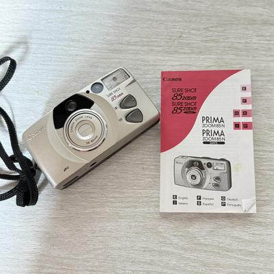 LOT 277K: Canon Sure Shot 85 Zoom Platinum 35mm & Camera Accessories: Canon Speedlite 155A, Super Albinar Multi-Coated Mini-Zoom...