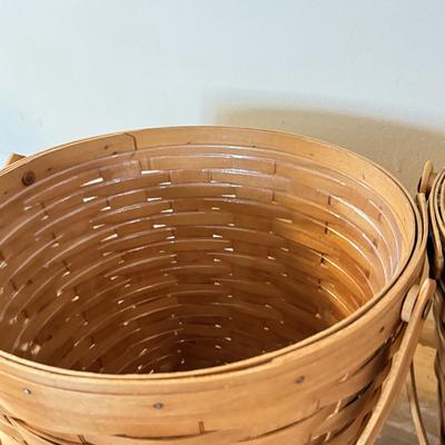 LOT 307K: Four Hand Woven Longaberger Baskets w/ Plastic Inserts