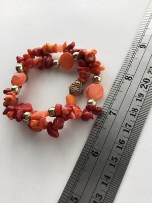 Orange nugget beaded two stretchy bracelets